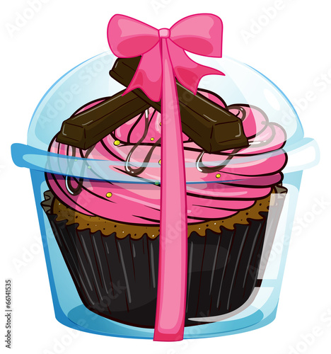 A cupcake with a pink icing