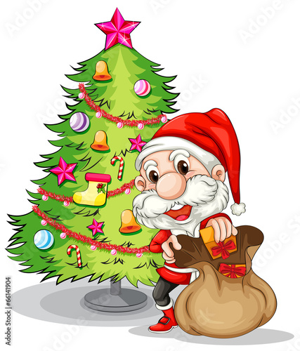 Santa Claus near the christmas tree