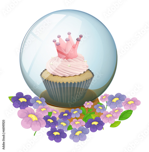 A crystal ball with a cupcake inside