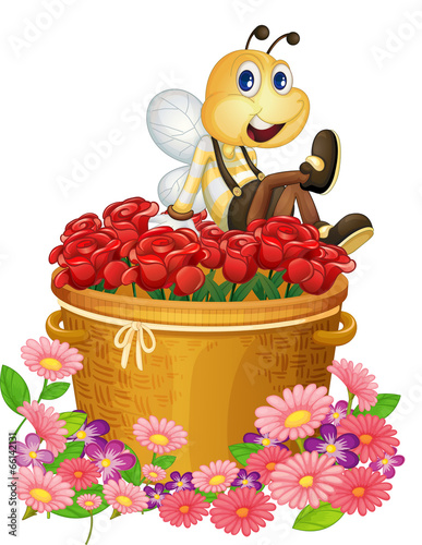 A basket of red roses with a big bee