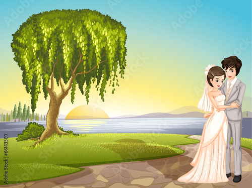 A couple across the tree