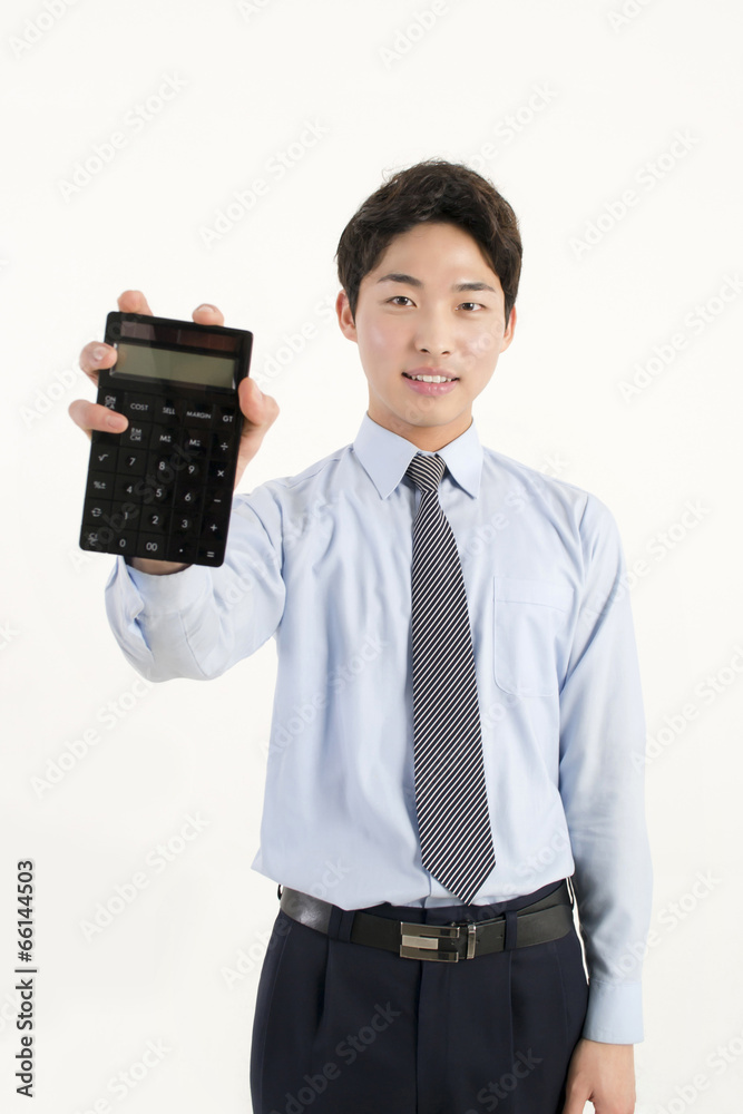Asian bank teller with a calculator Asian bank teller with a calculator