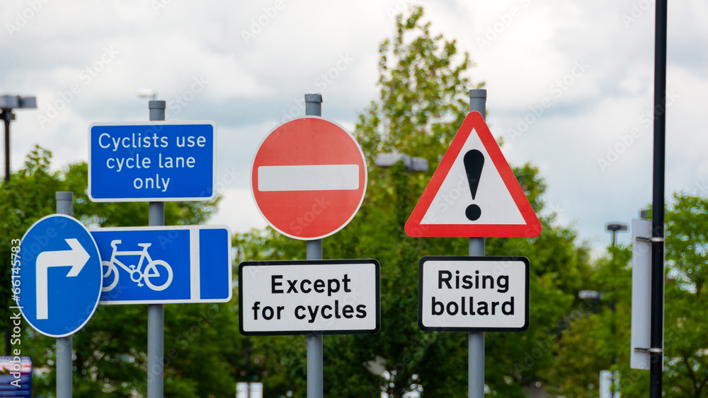 Sign for rising bollard, hazard, cyle lane, hazard