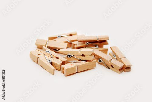 Pile of Antique Wooden Closepins Isolated photo