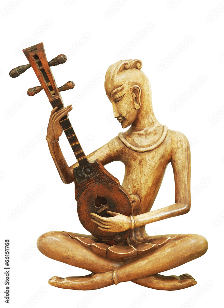 Thai musicial doll made from wood on isolate white background Thai musicial doll made from wood on isolate white background
