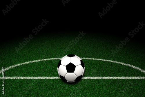 Soccer ball on field © yodiyim