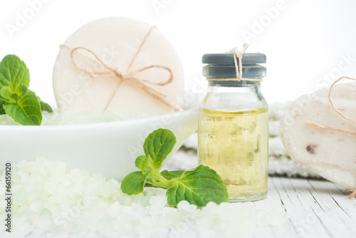 Oil with salt  herbs and pieces of natural soap