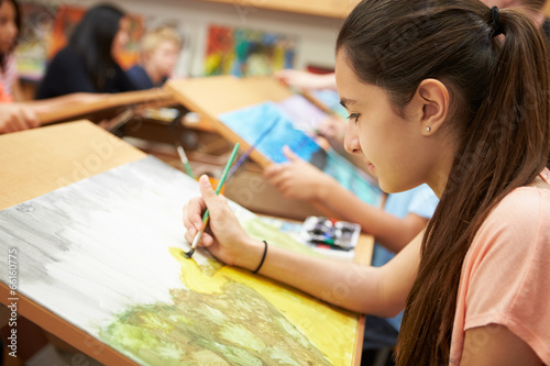 Female Pupil In High School Art Class