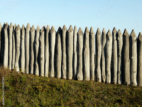 wooden palisade of the protective fence