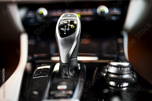 Detail of an automatic gear shifter in a new, modern car photo