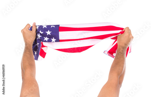 Hand holding American flag isolated on white background photo