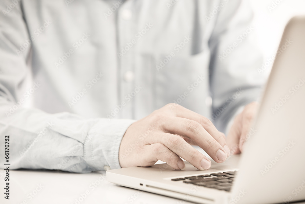 Close-up of Businessman using laptop Close-up of Businessman using laptop