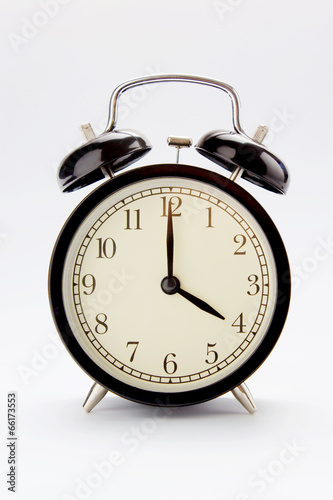 Classic alarm clock at 4 O'clock