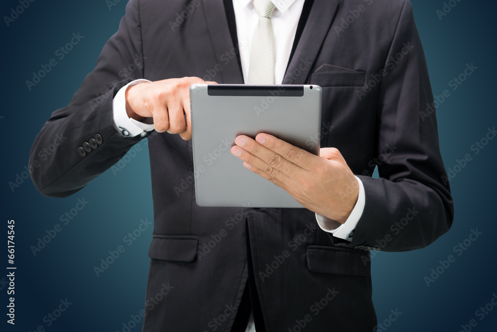 Businessman standing posture hand holding blank tablet isolated Businessman standing posture hand holding blank tablet isolated