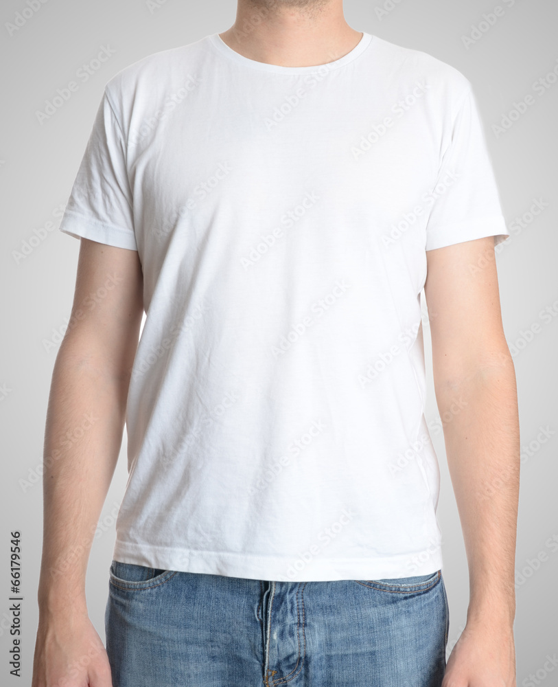 Man wearing blank t-shirt isolated on gray Man wearing blank t-shirt isolated on gray