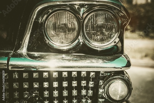 Close-up of retro car facia with chrome grille