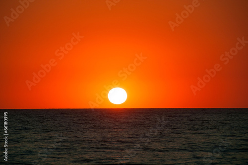 Fototapeta Naklejka Na Ścianę i Meble -  Orange Sunset on the sea horizon, skyline