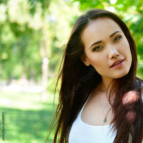 young beautiful lady outdoor portrait, girl with long brown hair