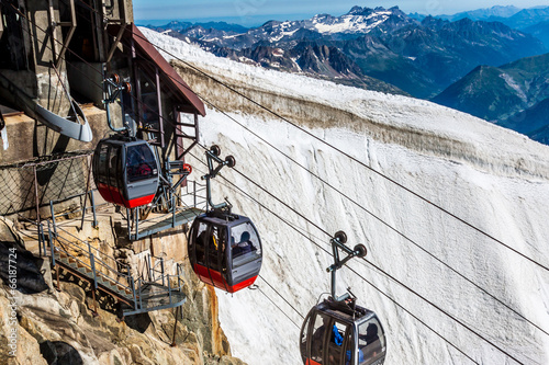 Red cable car railway, cableway, in ski resort