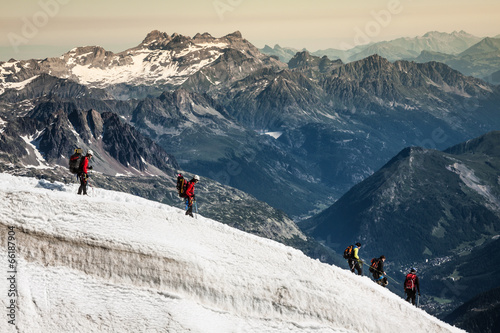 Mont Blanc, Chamonix, French Alps. France. - tourists climbing u