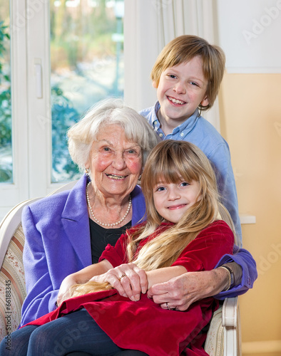 Portrait of a grandmother with her grandchildren.