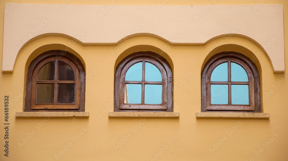 Three windows of a modernist building Three windows of a modernist building