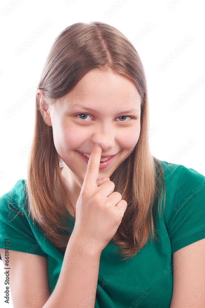 Teen girl picking her nose Stock Photo