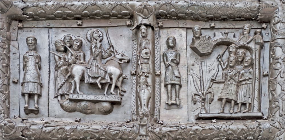 Ancient bronze gates with scenes from the Bible