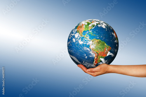 Globe on her hands, South and North America. Elements of this im