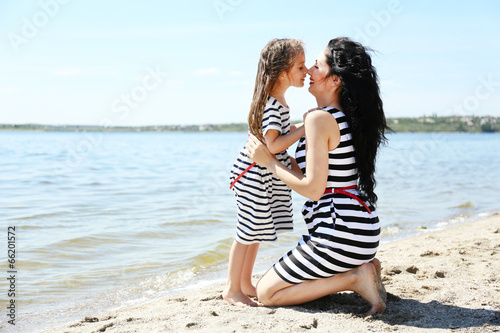 Happy mom and daughter. Wal...