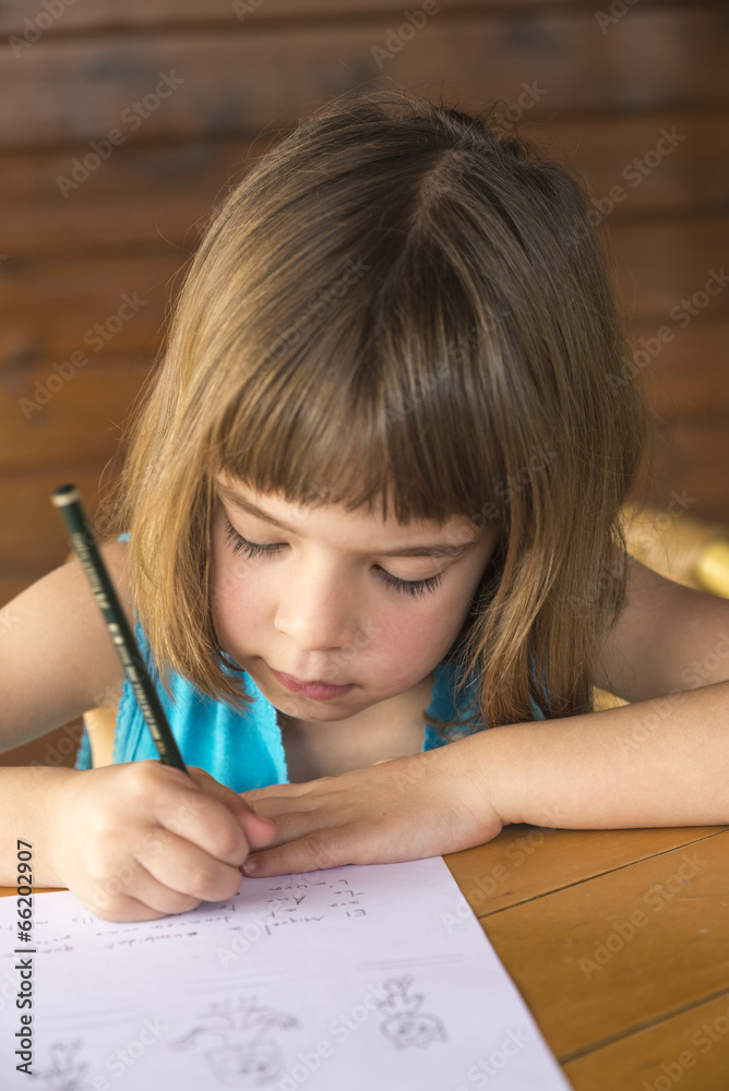 Little girl writing Little girl writing