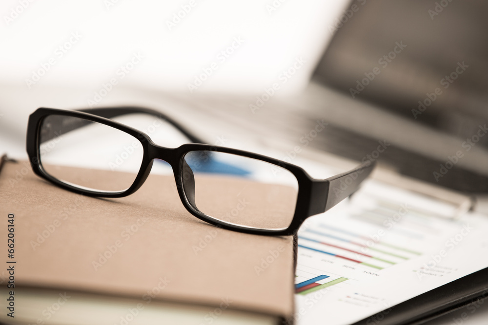 Businessman analyzing investment charts with laptop Businessman analyzing investment charts with laptop