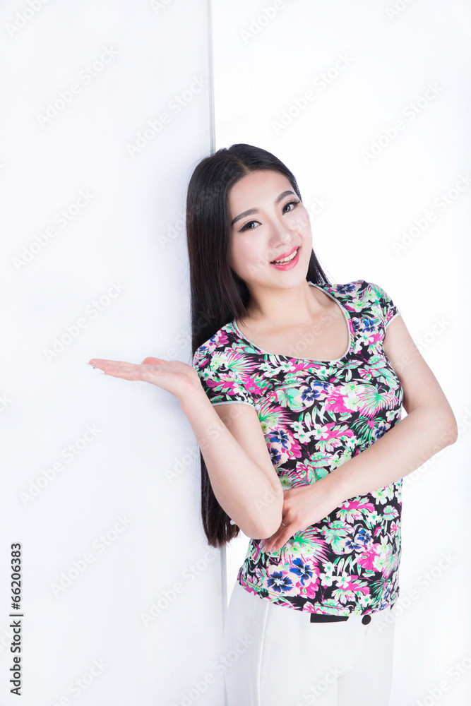 young woman showing blank signboard, isolated on white backgroun young woman showing blank signboard, isolated on white backgroun