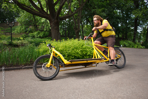 Bicycle messenger with cargo bike speeding