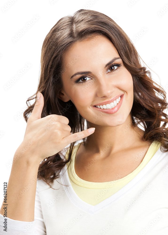 Beautiful woman showing call me gesture, isolated