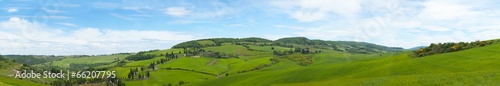Beautiful panorama of Tuscany with twisting road and cypresses