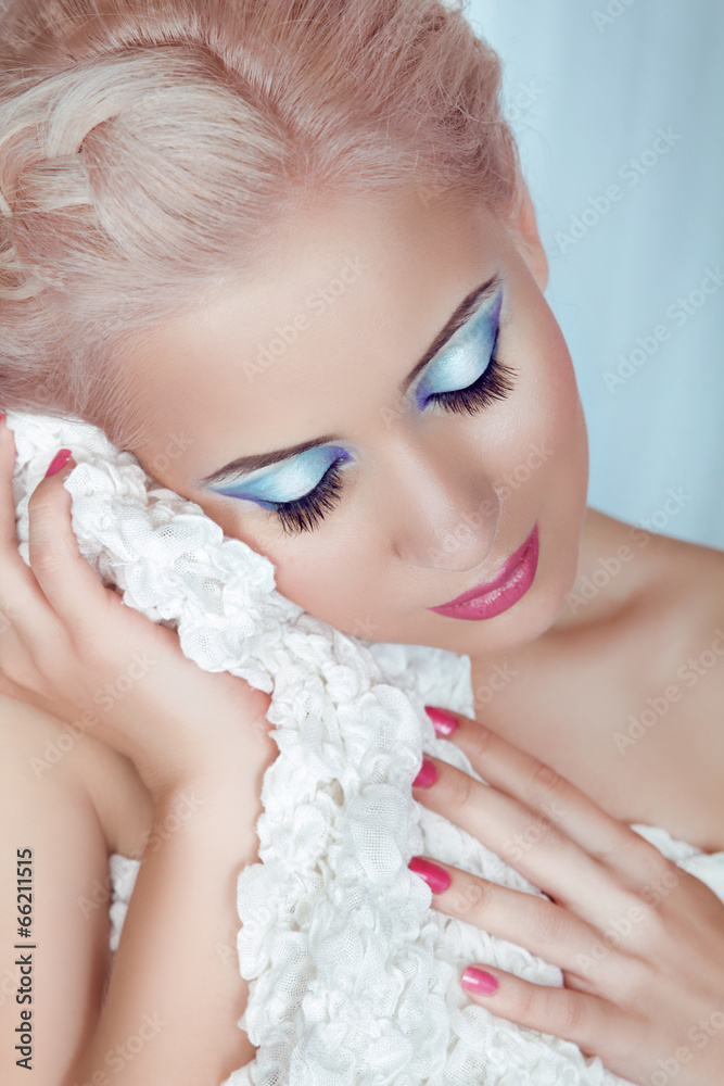 Makeup and Hairstyle. Blond girl with manicured nail and profess Makeup and Hairstyle. Blond girl with manicured nail and profess