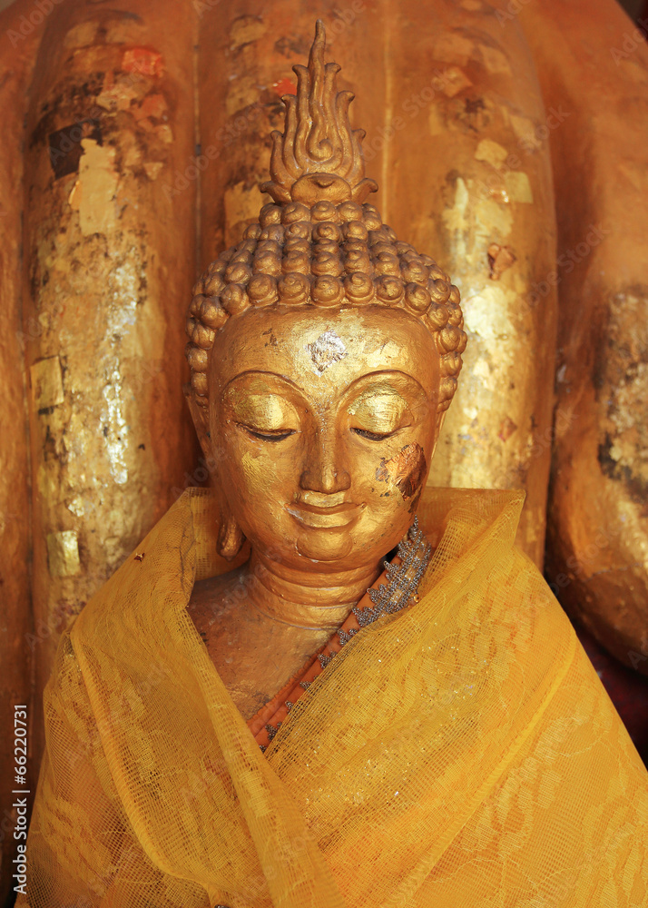 buddha statue sculpture with golden face