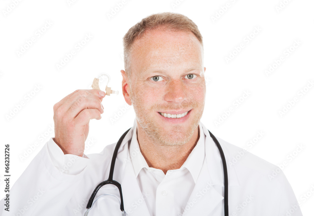 Doctor Holding Hearing Aid Device Doctor Holding Hearing Aid Device