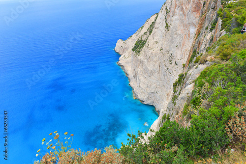 Fototapeta Naklejka Na Ścianę i Meble -  Blue water and rocks - Greece islands coastline