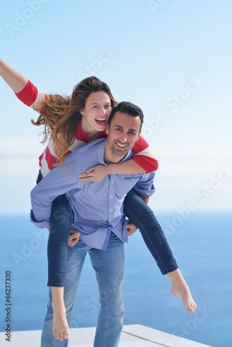 happy young romantic couple have fun relax