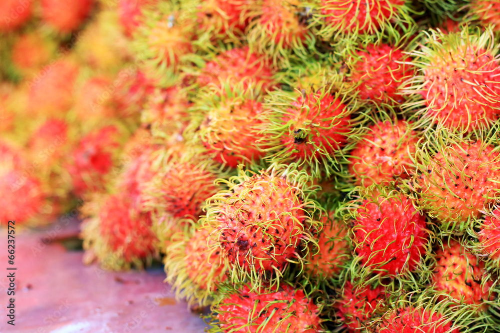 Sweet fruits rambutan in the market Sweet fruits rambutan in the market