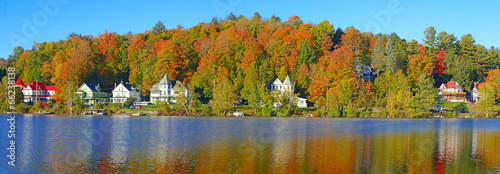 Fall foliage and reflection in Saranac Lake, New York