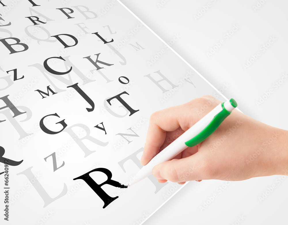 Hand writing various letters on white plain paper Hand writing various letters on white plain paper