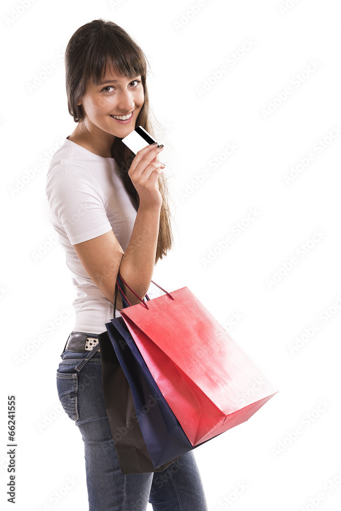 Portrait of young happy smiling woman with shopping bags