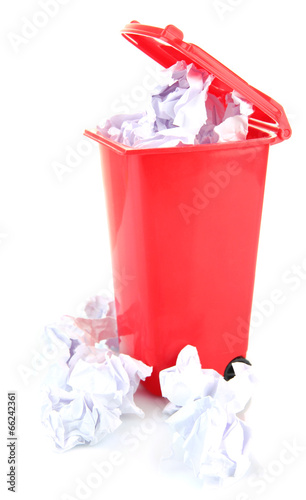 Crumpled paper balls in trashcan isolated on white