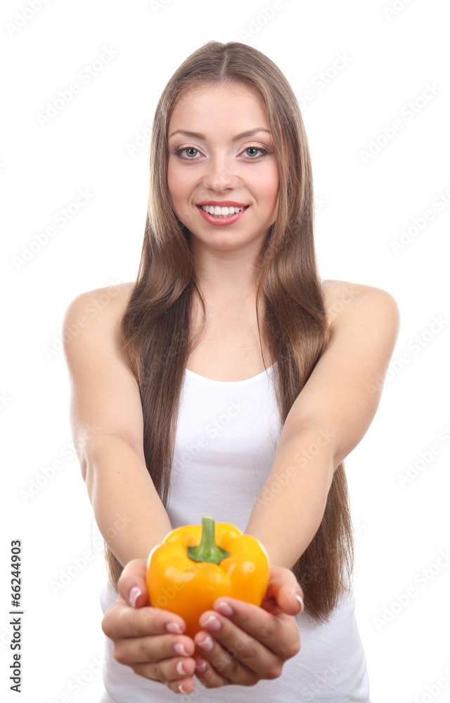 Beautiful girl with yellow pepper, isolated on white Beautiful girl with yellow pepper, isolated on white