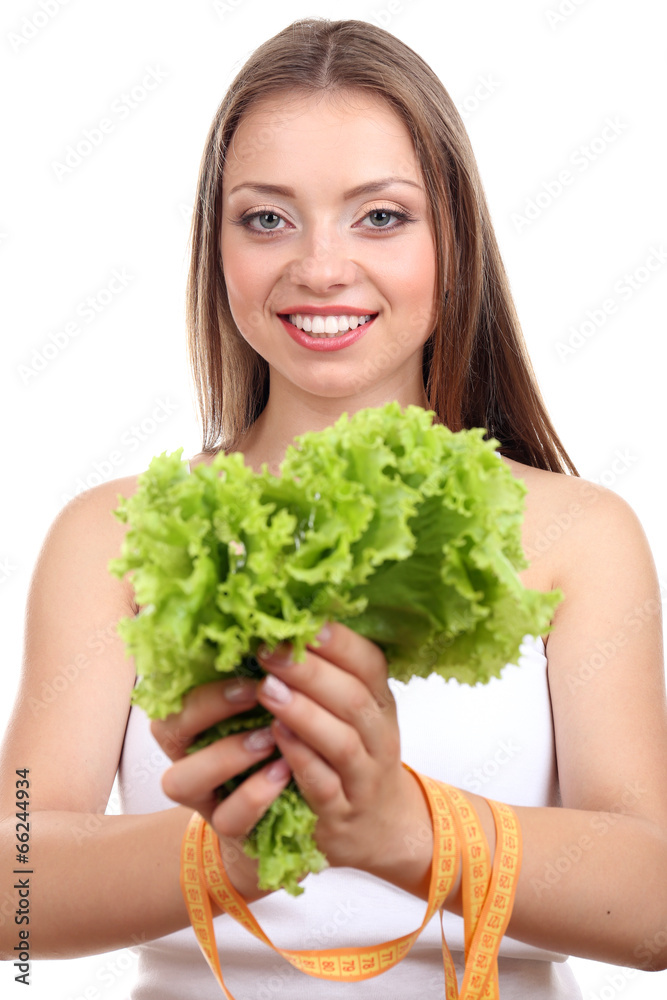Beautiful girl with lettuce and measuring tape, isolated Beautiful girl with lettuce and measuring tape, isolated