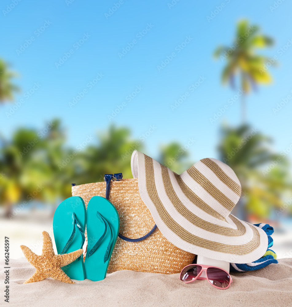 Summer accessories on sandy beach - obrazy, fototapety, plakaty 