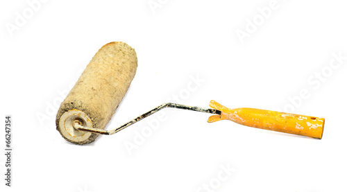Old paint roller. Isolated on white background
